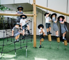 Early years class on a climbing frame